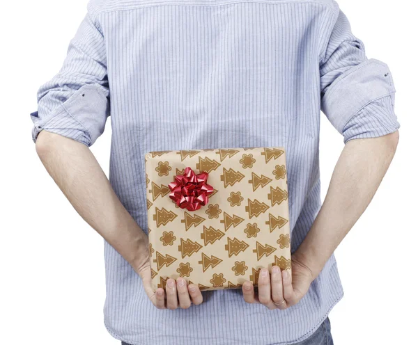 Young man holding a present Royalty Free Stock Images