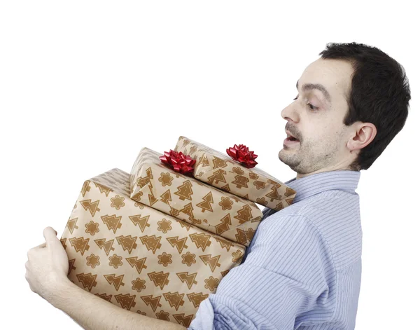 Young man holding a present — Stock Photo, Image