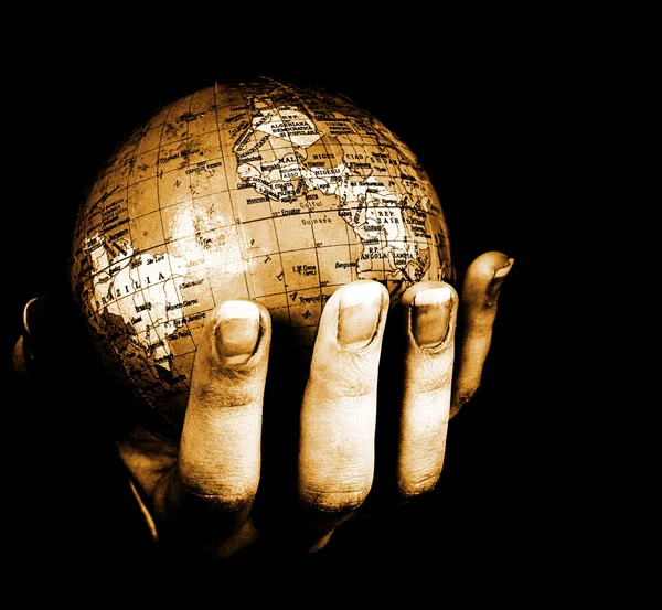 Globe in a girl's hands — Stock Photo, Image