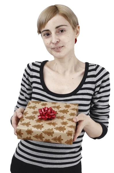 Young woman holding a present — Stock Photo, Image