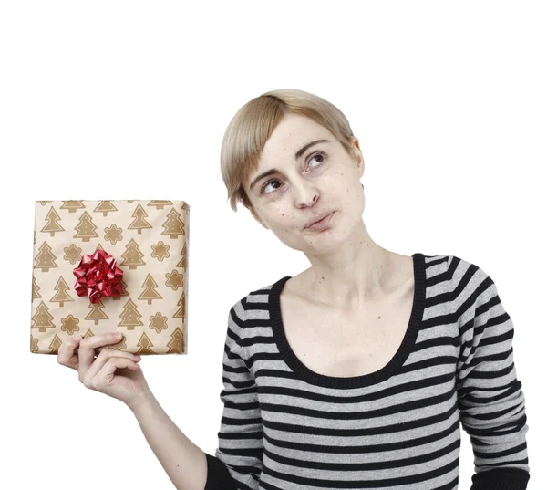 Young woman holding a present — Stock Photo, Image