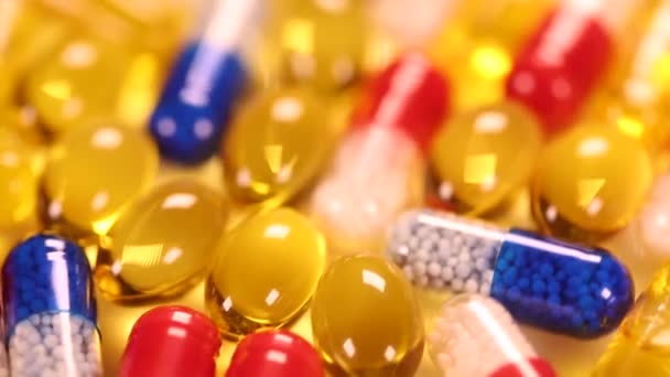 Bakgrund med tabletter och kapslar — Stockvideo