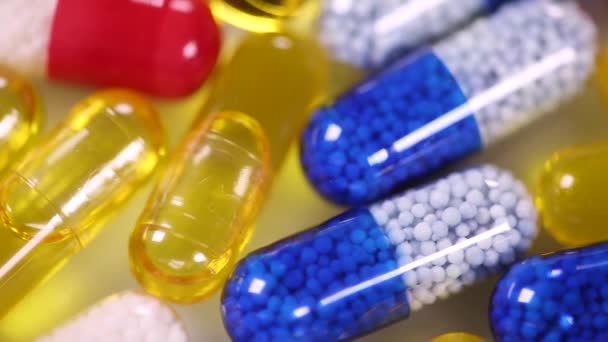 Arrière-plan médical avec capsules colorées — Video