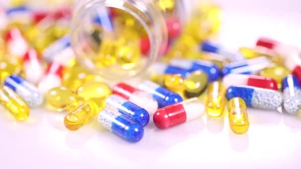 Antecedentes con pastillas y cápsulas — Vídeo de stock