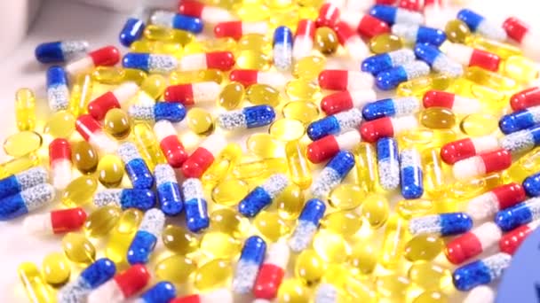 Colorful  pills and capsules — Stock Video