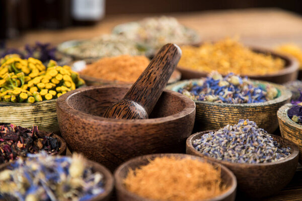 Alternative medicine, dried herbs background