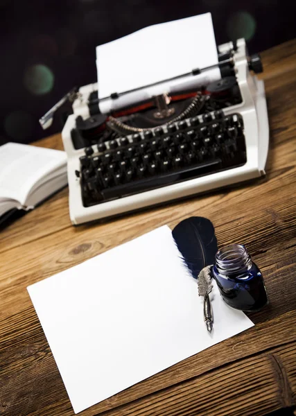 Retro typewriter with old paper — Stock Photo, Image