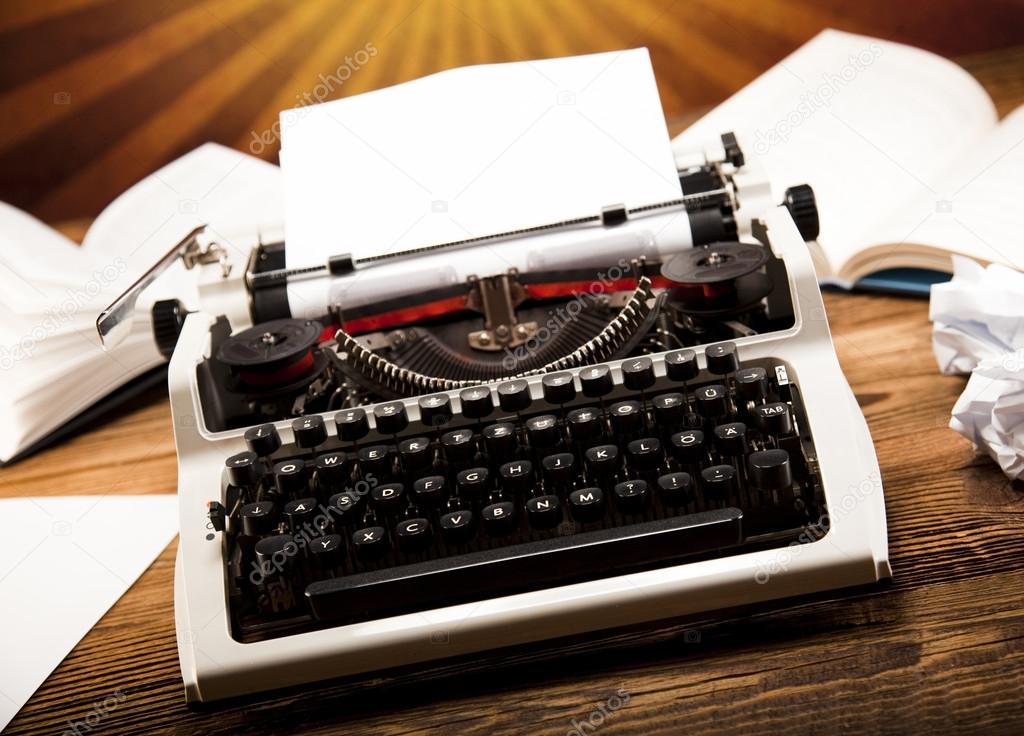 Typewriter with books