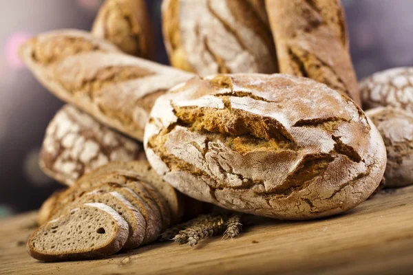 Sammansättning med limpor bröd — Stockfoto