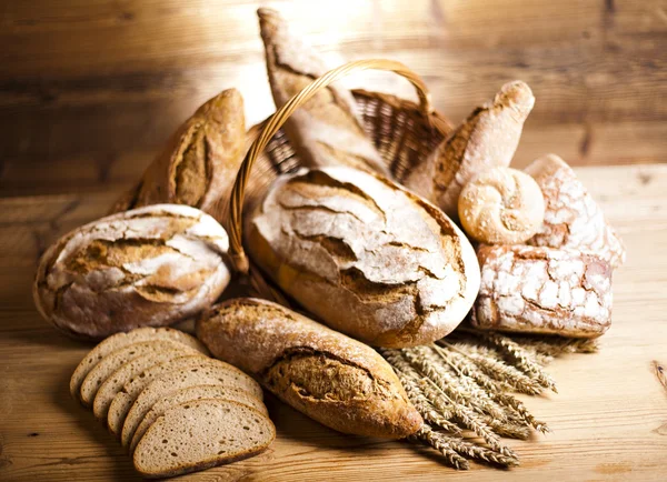 Traditional bread in wicker basket — Stock Photo, Image