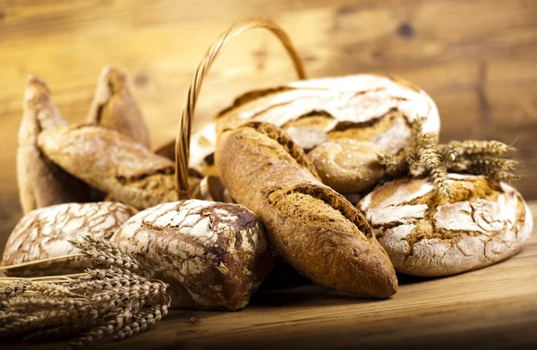 Traditional bread in wicker basket — Stock Photo, Image