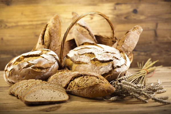 Traditional bread in wicker basket — Stock Photo, Image