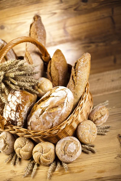 Baked breads in basket — Stock Photo, Image