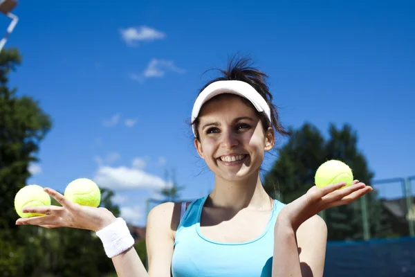 Mujer jugando tenis —  Fotos de Stock