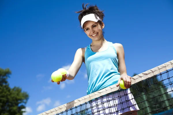 Kvinna som spelar tennis — Stockfoto