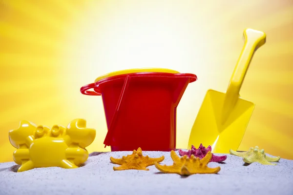 Plastic toys on the beach — Stock Photo, Image