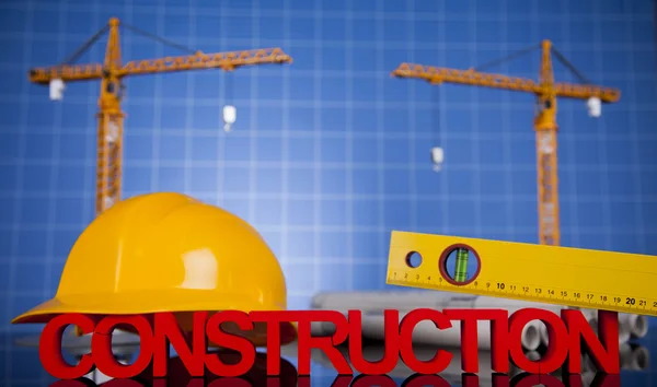 Construction plan with a crane and yellow helmet — Stock Photo, Image