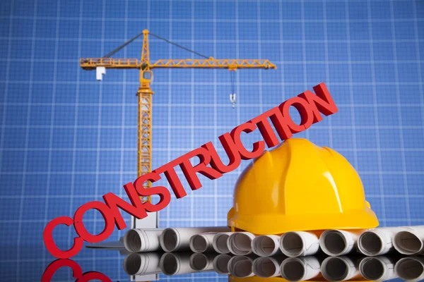 Project drawings, building and cranes under construction — Stock Photo, Image