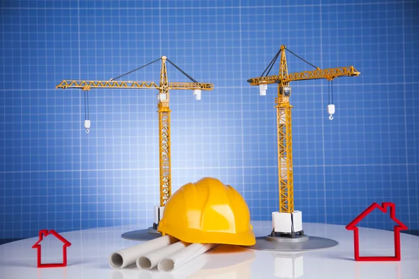 Byggarbetsplatsen, crane och ritningar — Stockfoto