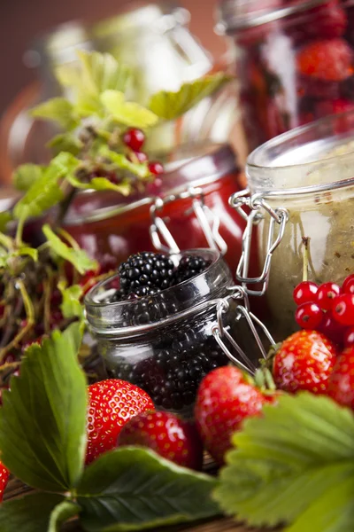 Fresh berries and wild berry jam — Stock Photo, Image