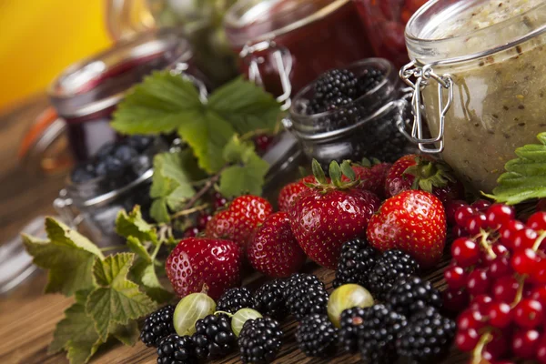 Fresh berries and wild berry jam — Stock Photo, Image