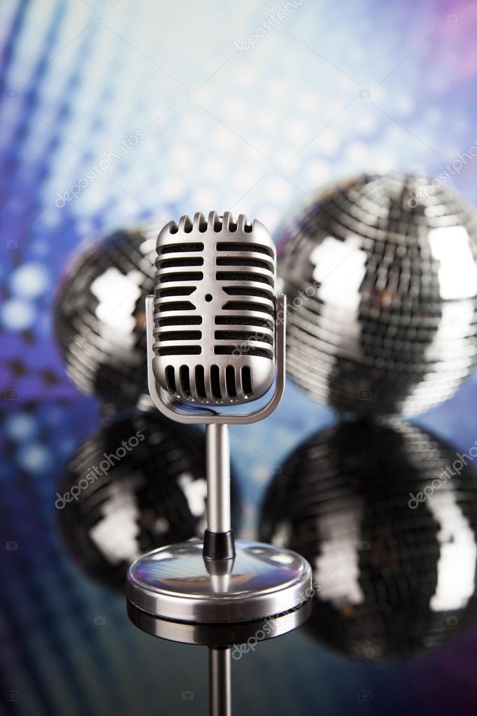 retro style microphone and disco balls