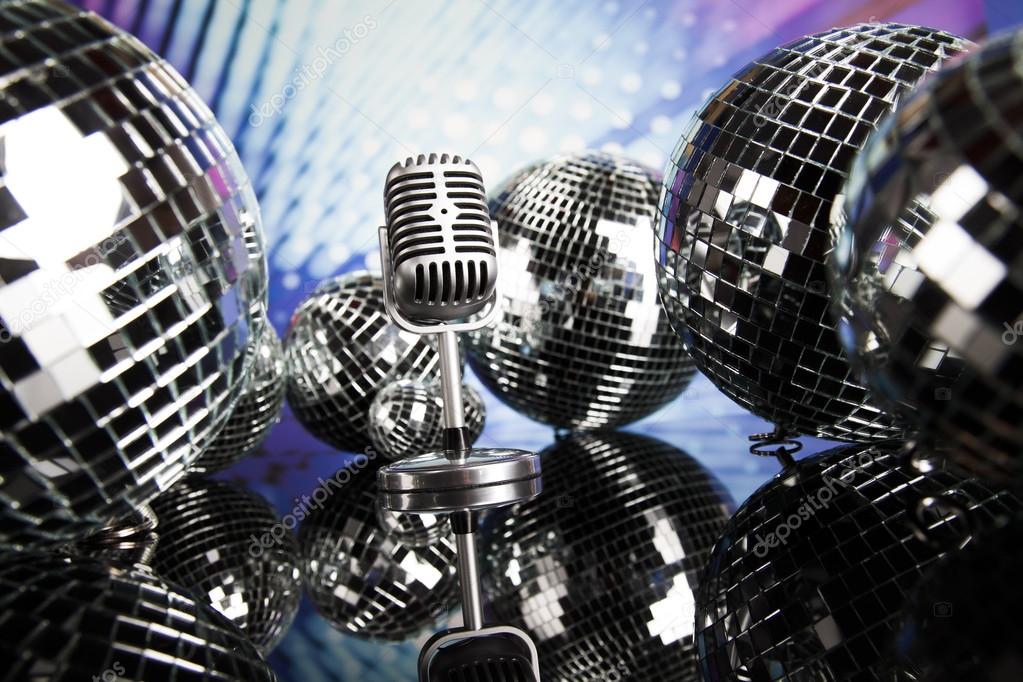 retro style microphone and disco balls
