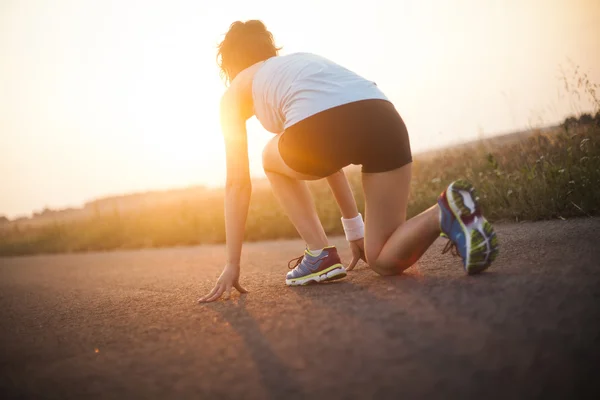 Woman preparing to jogging — Stock Photo, Image