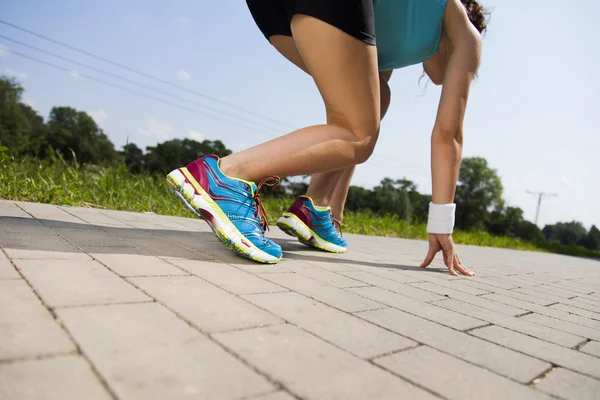 Woman preparing to jogging — Stock Photo, Image