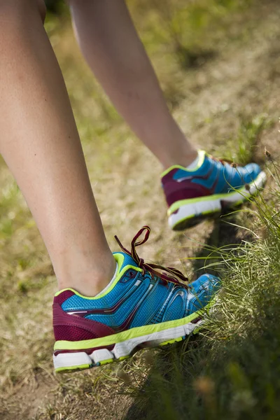 Runner feet running on road — Stock Photo, Image