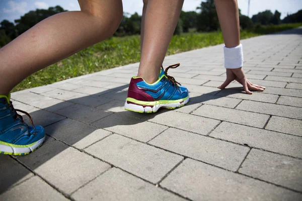 Woman preparing to jogging — Stock Photo, Image