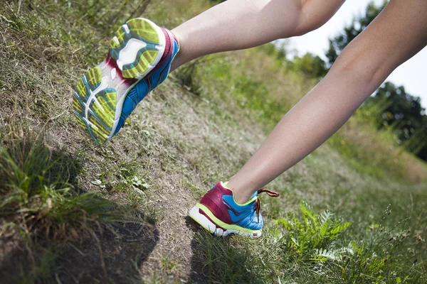 Woman running on road at outdoor — Stock Photo, Image