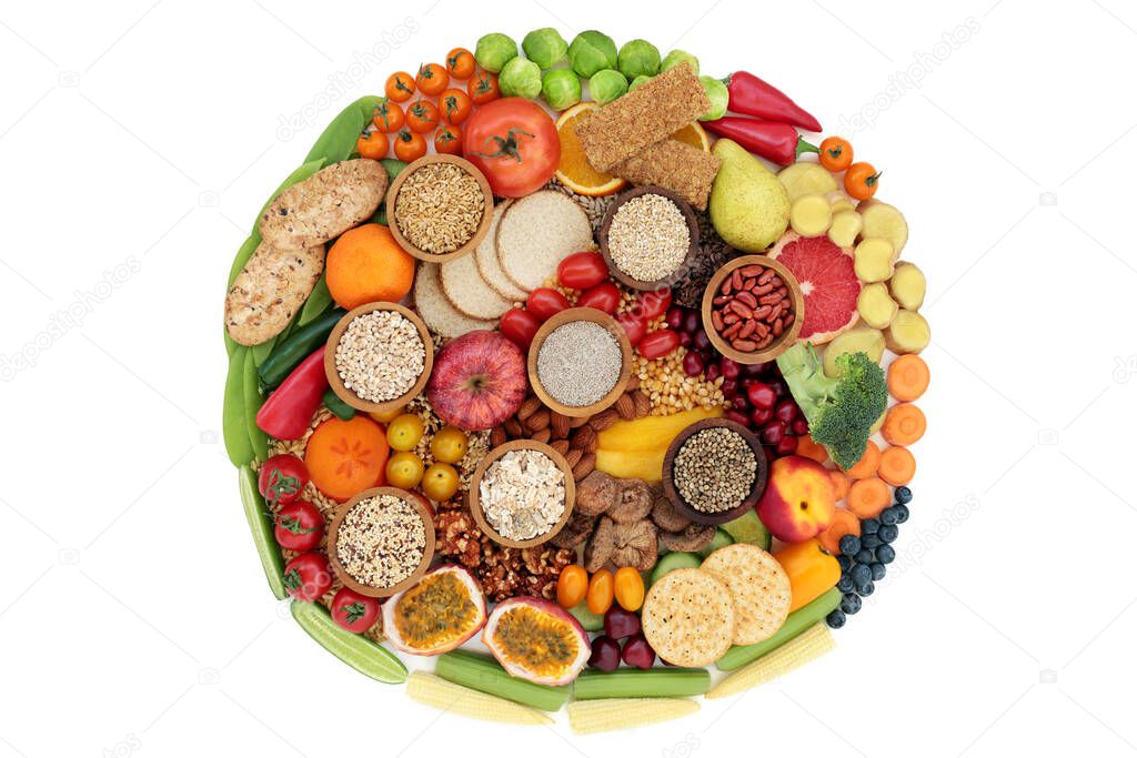 Vegan health food high in fibre & good for digestive health. Foods in a circle & high in antioxidants, minerals, vitamins, anthocyanins, omega 3, protein, & smart carbs. Flat lay on white background.