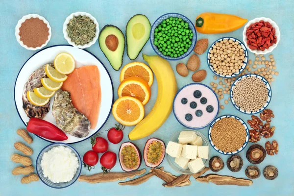 Health food & herbal medicine to stabilise bipolar disorder & manic depression with foods high in omega 3, protein, vitamins, selenium, magnesium, serotonin & tryptophan. Health care concept. Flat lay.
