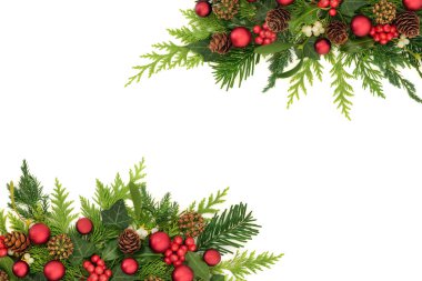 Festive Christmas red bauble decorations with nature flora of holly, mistletoe berries, ivy, fir, pine cones. Xmas design for holiday season on white. Greeting card.
