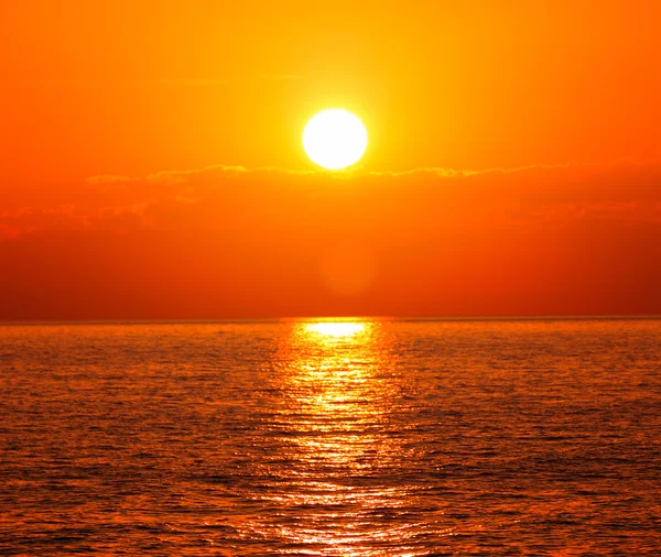 Sunset with orange sun — Stock Photo, Image