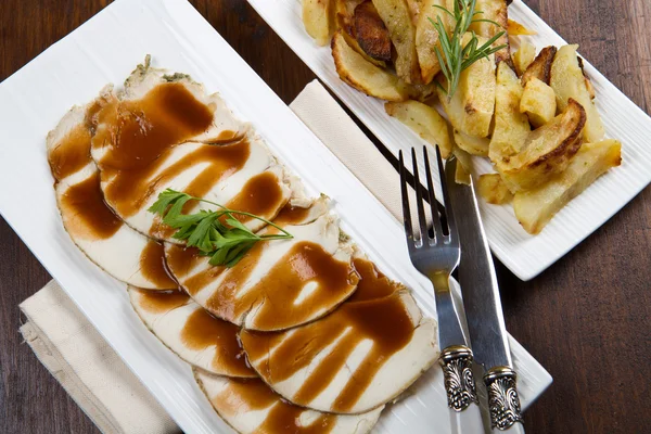 Roast of pork with potatoes — Stock Photo, Image