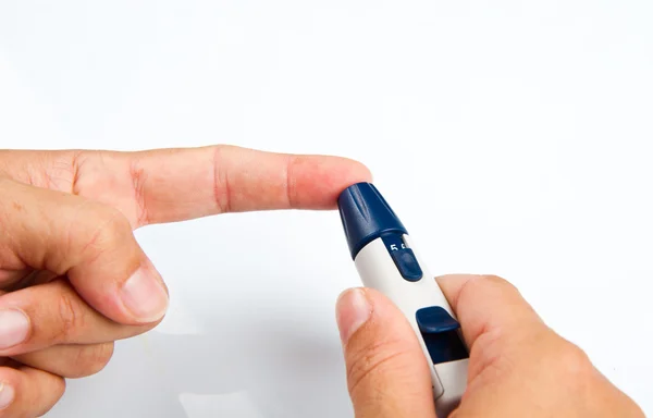 Woman doing blood glucose control — Stock Photo, Image