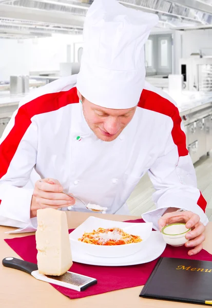 Young cook in the kitchen — Stock Photo, Image