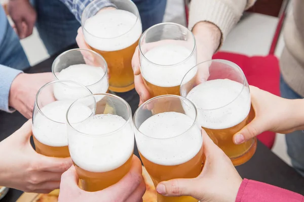 Group Happy Friends Drinking Toasting Beer Home — Stock Photo, Image