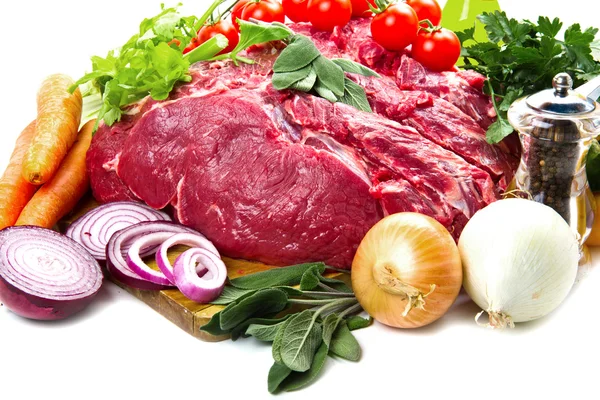 Huge red meat chunk with vegetables — Stock Photo, Image