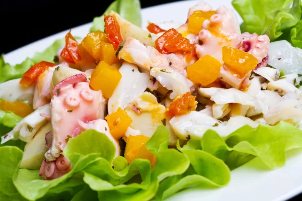 Octopus salad with artichoke — Stock Photo, Image