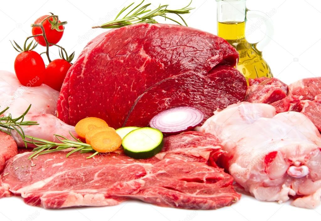 Fresh butcher cut meat assortment garnished