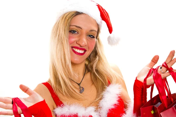 Allegra donna di Natale in abito di Babbo Natale sorridente e tenuta sho — Foto Stock