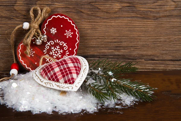 Decoración del corazón de Navidad de madera sobre fondo de madera —  Fotos de Stock