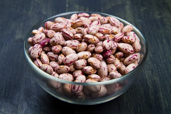 Pinto beans on glass bowl — Stock Photo, Image