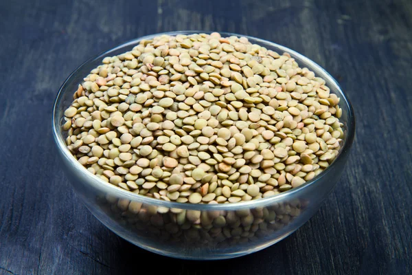 Lentils on glass bowl — Stock Photo, Image