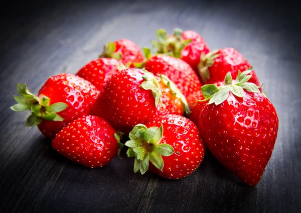 Strawberry on wood background — Stock Photo, Image