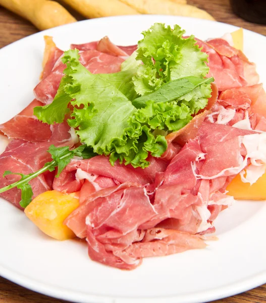 Olasz prosciutto, sárgadinnye — Stock Fotó