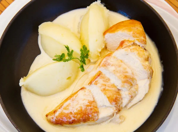 Dish with chicken milk and puree — Stock Photo, Image